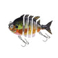 Black and green 6-segment hard fishing lure with clear lip and treble hooks