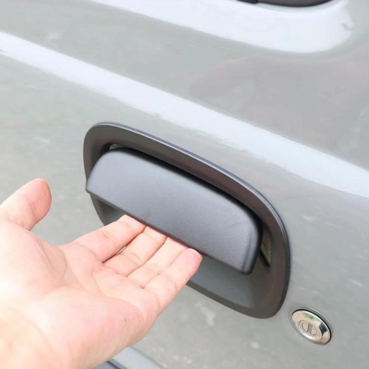 Black door handle bezel cover, matte finish with mounting recess