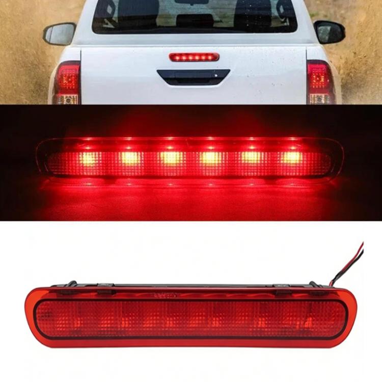 High-mounted brake light with red lens and illuminated LED grid