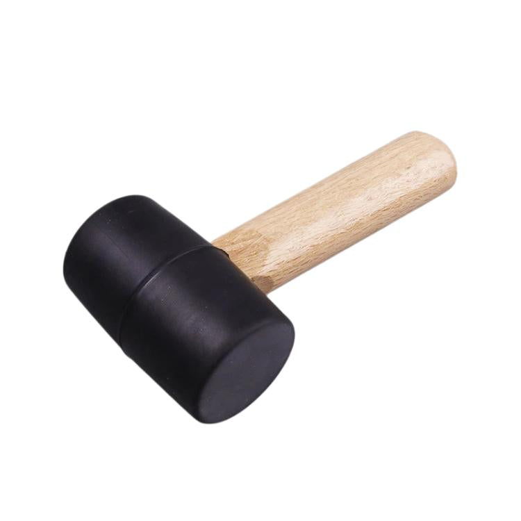 Rubber mallet with short light wood handle and black padded striking head
