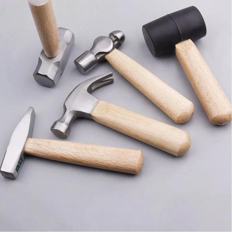 Assorted small hammers with light wood handles and metal heads