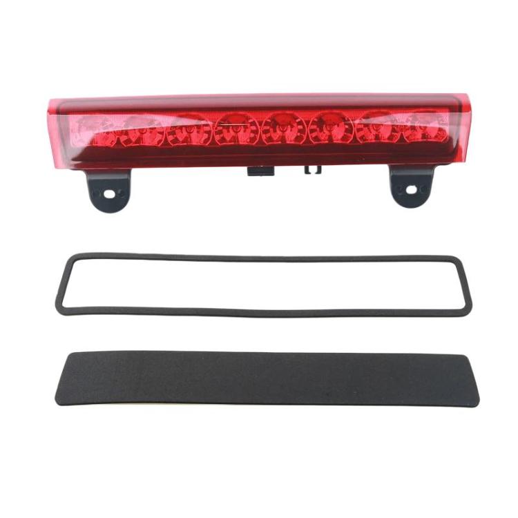 Rear tail light assembly with red lens and black mounting brackets