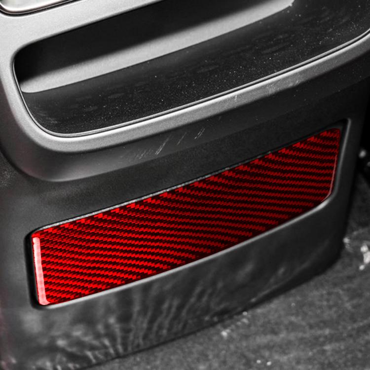 Red carbon-fiber style charging sticker applied to lower rear panel, rectangular