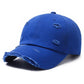 Distressed royal blue ripped baseball cap with frayed brim and ripped front panels