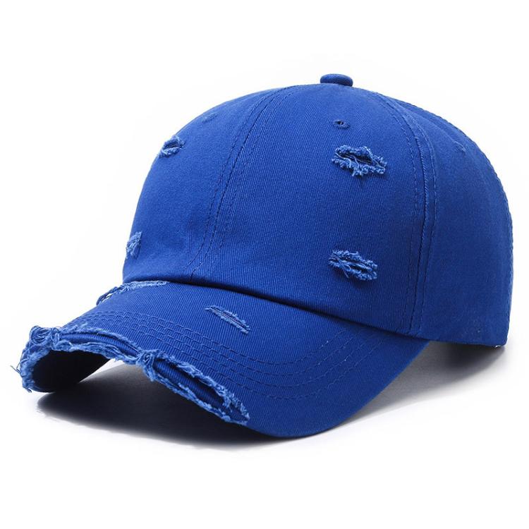Distressed royal blue ripped baseball cap with frayed brim and ripped front panels