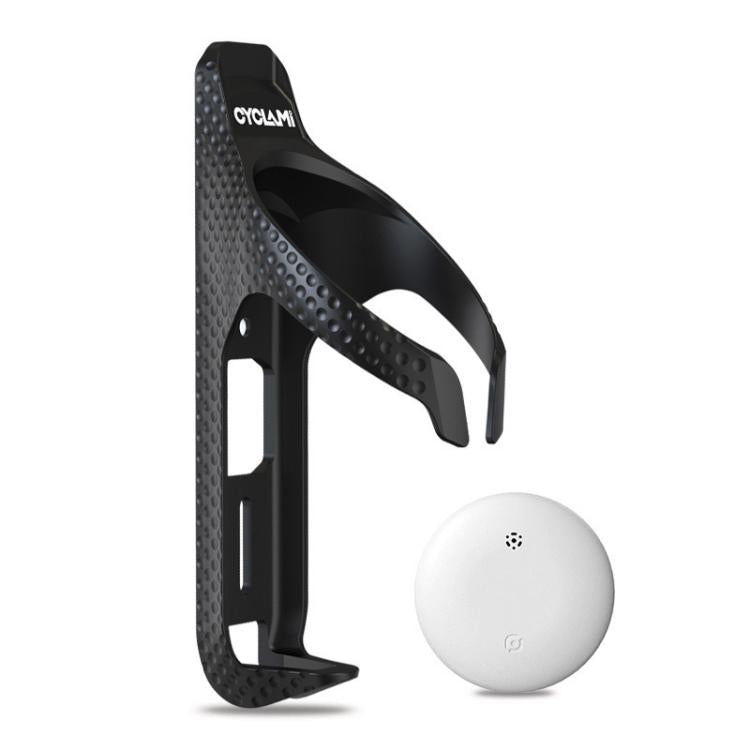 Black bicycle water bottle cage holder with white round tracker puck attached