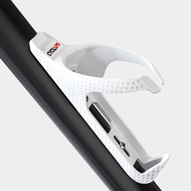 White bicycle water bottle cage mounted on a bike frame tube with grip texture