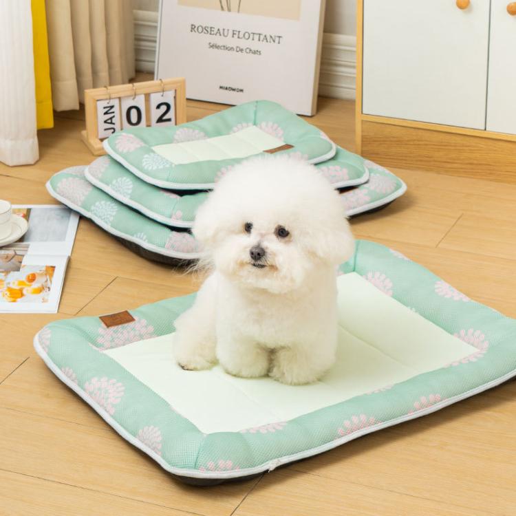 Breathable pet cooling mat with backrest pillow; mint edge with white center, dog resting