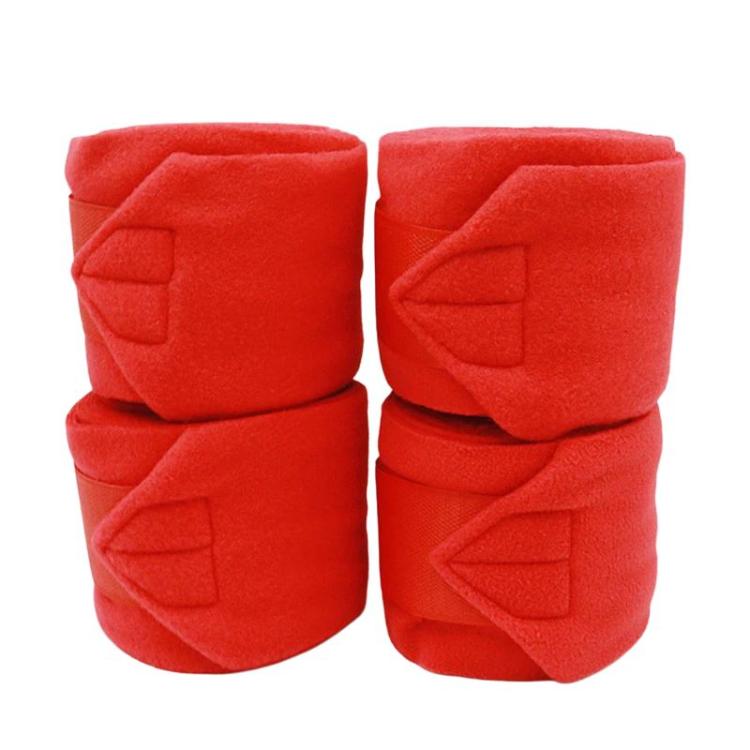 Set of 4 thick fleece horse leg wraps, red, with adhesive fastening pads.