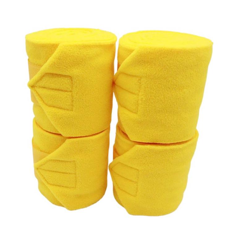 Set of 4 thick fleece horse leg wraps, yellow, with adhesive fastening pads.