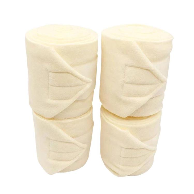 Set of 4 thick fleece horse leg wraps, beige, with adhesive fastening pads.