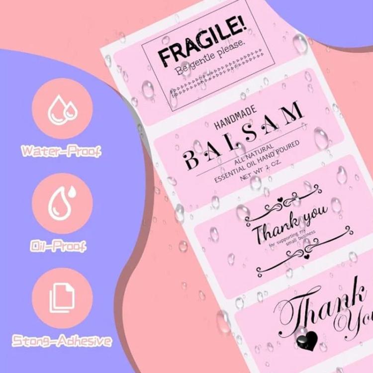 Pink adhesive labels roll with fragile and thank-you design samples