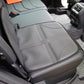 Booster pad insert on a gray car seat with light trim
