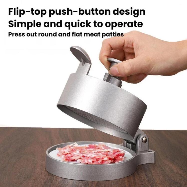 Manual meat patty press with flip-top push-button, forming round patty, silver