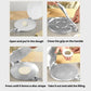 Round dumpling wrapper press with long handle, silver base forming a dough disc