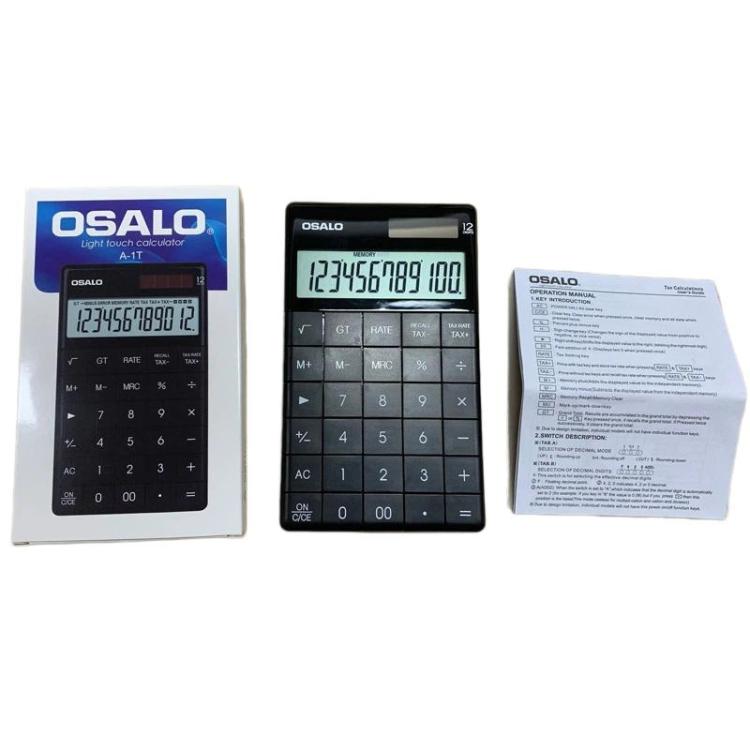Tax calculator bundle with black calculator, box, and instruction sheet