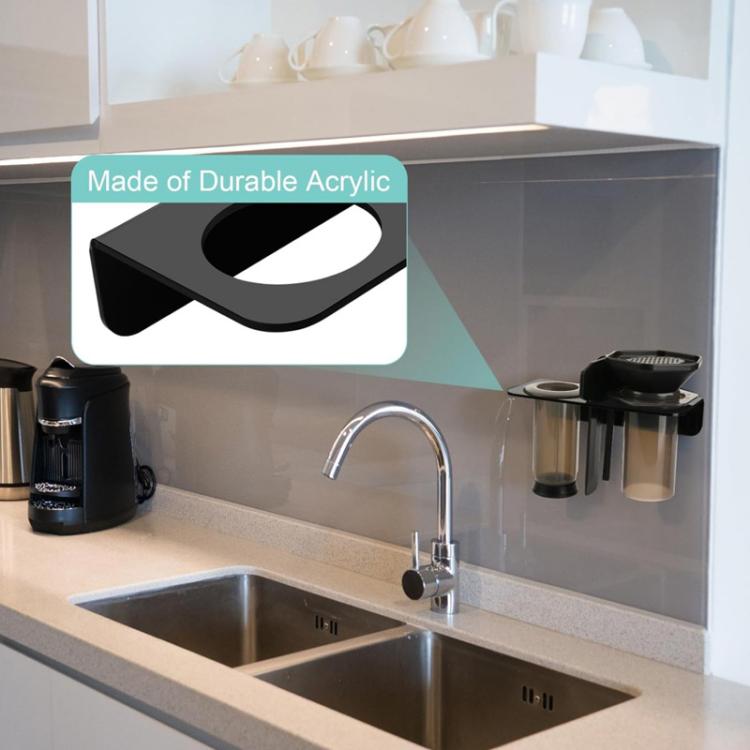 Black acrylic wall-mount holder with circular openings above a sink area