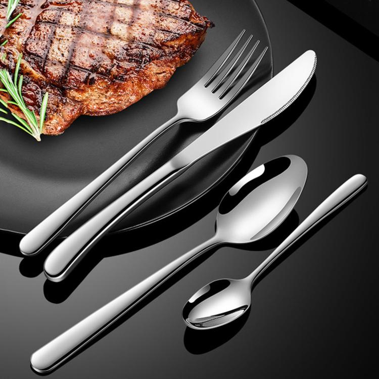 Stainless steel cutlery set with fork, knife, and spoon, polished finish