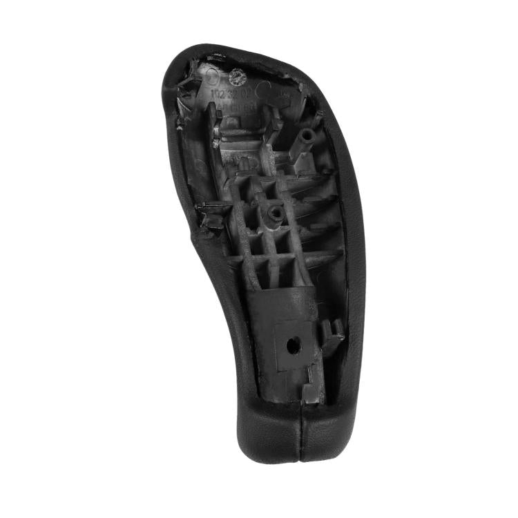 Black gear shift knob cover underside with molded clips and cutouts for fit.