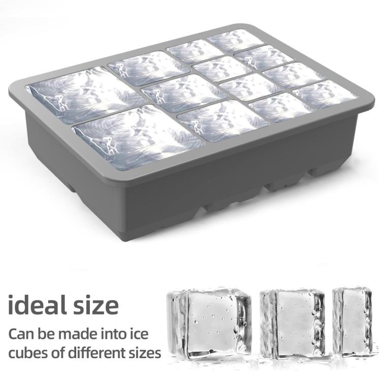 Gray silicone ice cube tray with clear ice cubes and a transparent view lid