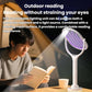 Electric mosquito racket on a table stand with glowing purple mesh head