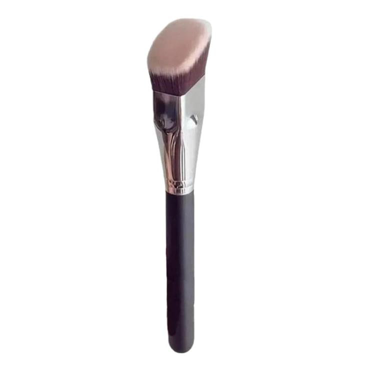 Angled flat makeup brush with trapezoid bristles and dark handle