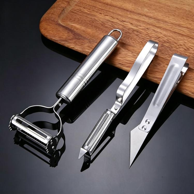 Two-piece stainless steel peeler and grater set with handles and interchangeable blades