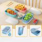 Set of silicone snack containers with lids, featuring separate sauce compartment