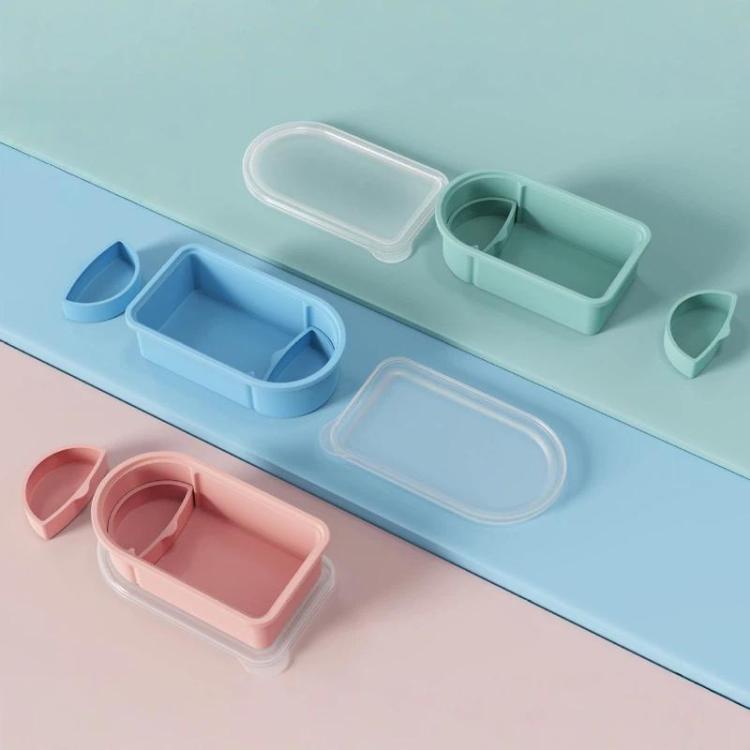 Assorted silicone snack container inserts and lids in blue and pink colors