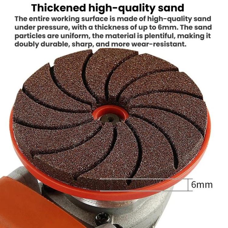 Close-up of dark brown grinding disc surface with threaded center and 6mm indicator
