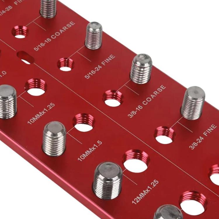 Close-up of red thread pitch gauge with labeled thread size posts and holes