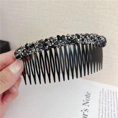 Sparkly hair clip comb with dark base and silver-gray rhinestone top row
