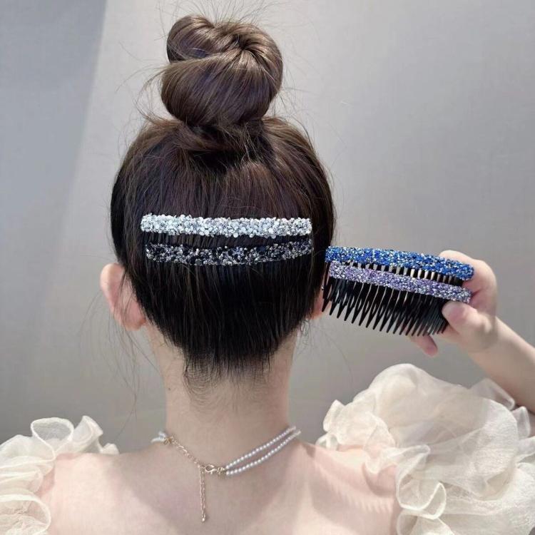 Sparkly hair clip comb on a bun with silver and blue rhinestone bands