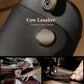 Close-up leather key pouch with metal keyring and round snap button closure