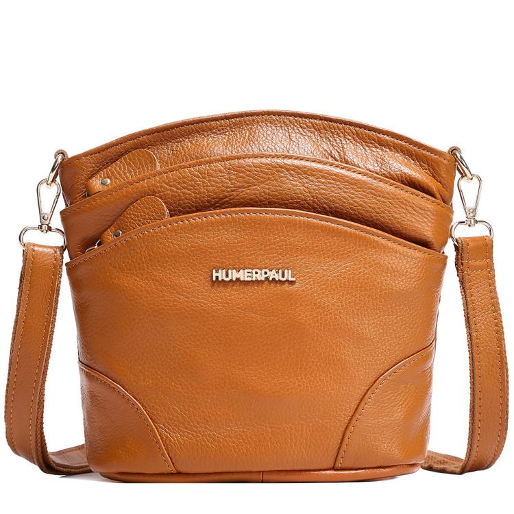Light brown leather shoulder crossbody bag with flap front and crossbody strap