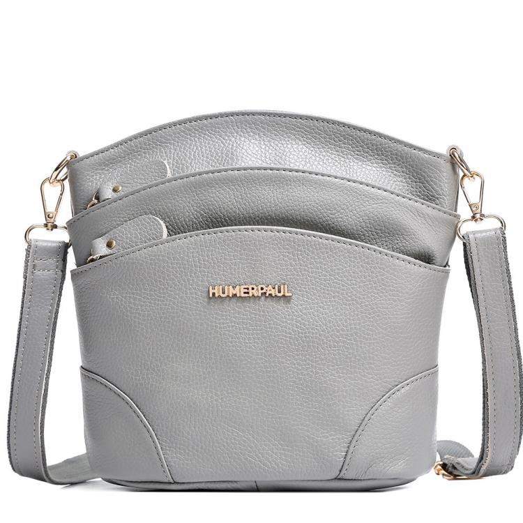 Gray leather shoulder crossbody bag with flap closure and crossbody shoulder strap