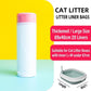 White cat litter liner bag roll with pink top lid beside litter tray
