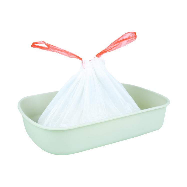White cat litter box liner bag with drawstring and orange easy-pull handles