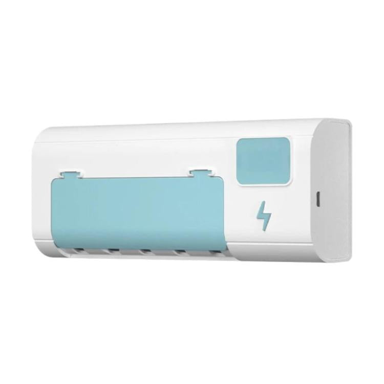 White wall-mounted toothbrush sanitizer stand with blue charging holder and small display window