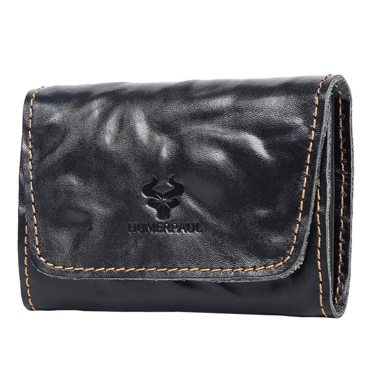 Black leather credit card wallet with front flap, stitched edges, and embossed logo.