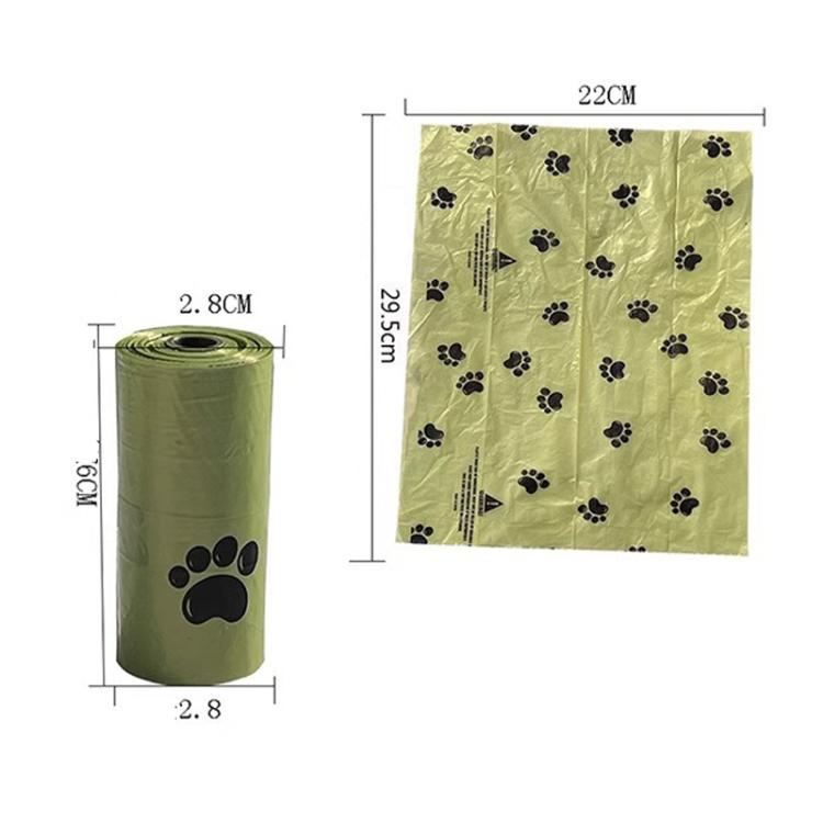 Green paw-print poop bag roll with bag dimensions diagram
