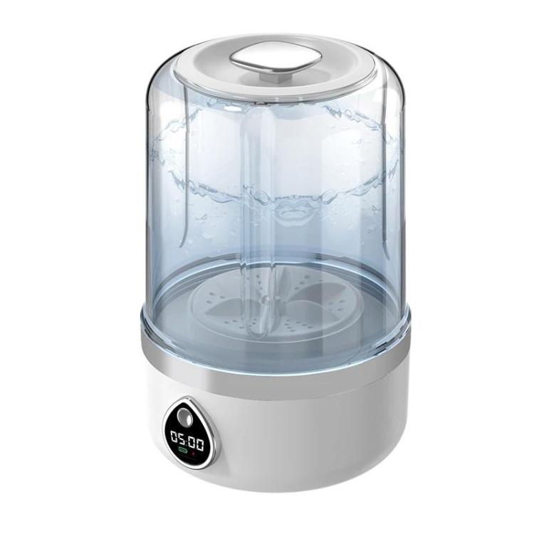 Mini portable washing machine with clear top and white base, digital display
