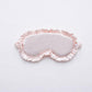 Light pink faux silk satin sleep mask with ruffle edge and elastic side ties