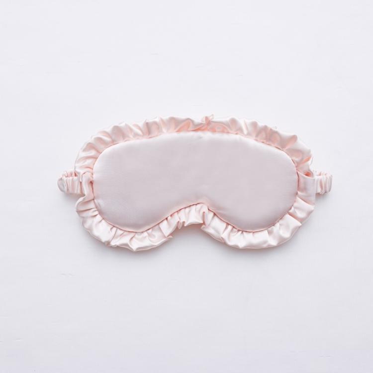 Light pink faux silk satin sleep mask with ruffle edge and elastic side ties