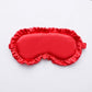Red faux silk satin sleep mask with ruffle edge and elastic side ties