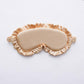 Beige faux silk satin sleep mask with ruffle edge and elastic side ties