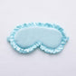 Light blue faux silk satin sleep mask with ruffle edge and elastic side ties