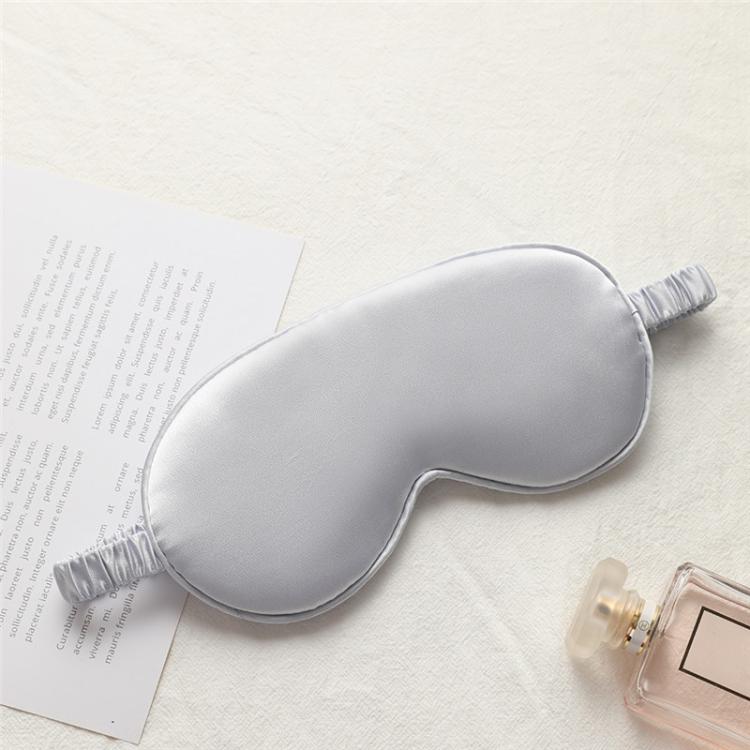 Silver gray satin sleep eye mask with elastic strap, smooth double-sided fabric.