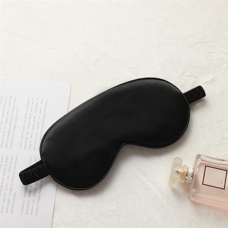 Black satin sleep eye mask with elastic strap, smooth double-sided fabric.
