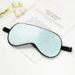 Light blue silk sleep mask with adjustable buckle and latex strap